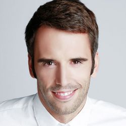 MAXIMILIAN J.