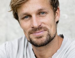 ANDREAS M.