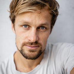 ANDREAS M.