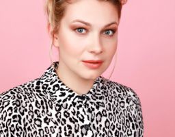 CAROLINE M.