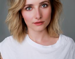 SARAH E.