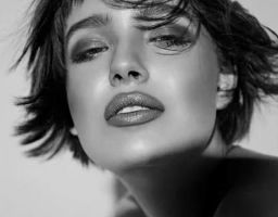 XENIA  M.