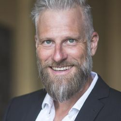 ANDREAS W.