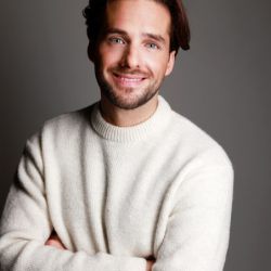 NICOLAS S.