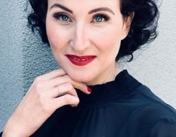 CLAUDIA V.